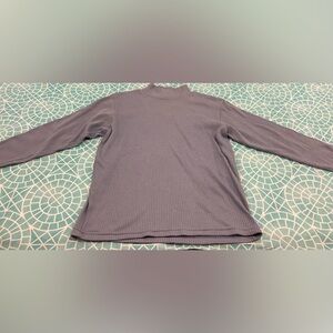 New Concepts violet-colored, classic ribbed mock turtleneck.